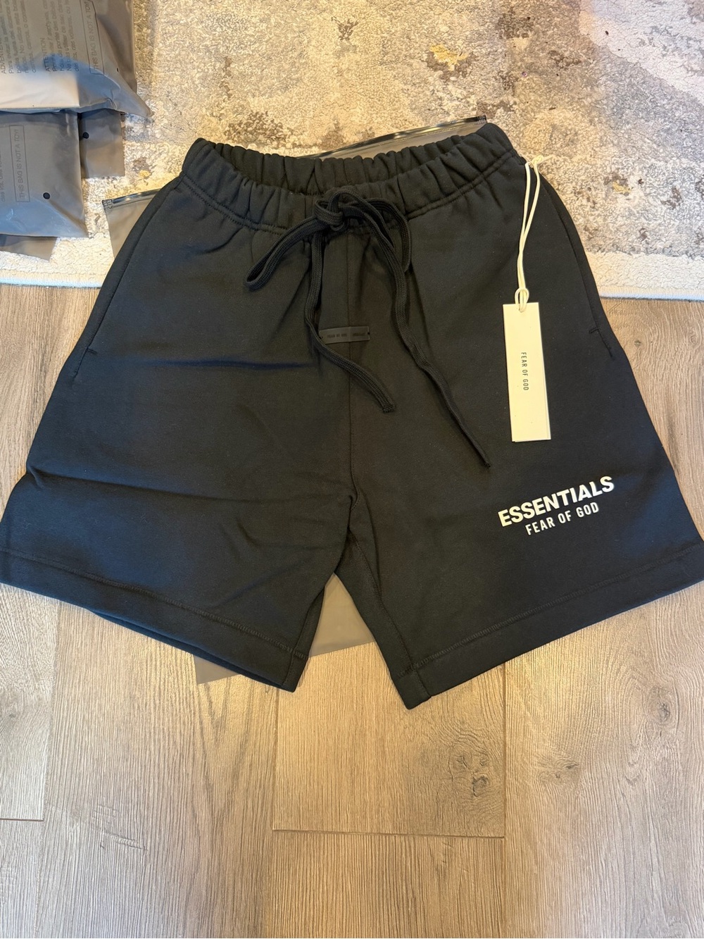 Brand new Fear of God ESSENTIALS Jet Black Men's Sweat Shorts with tags